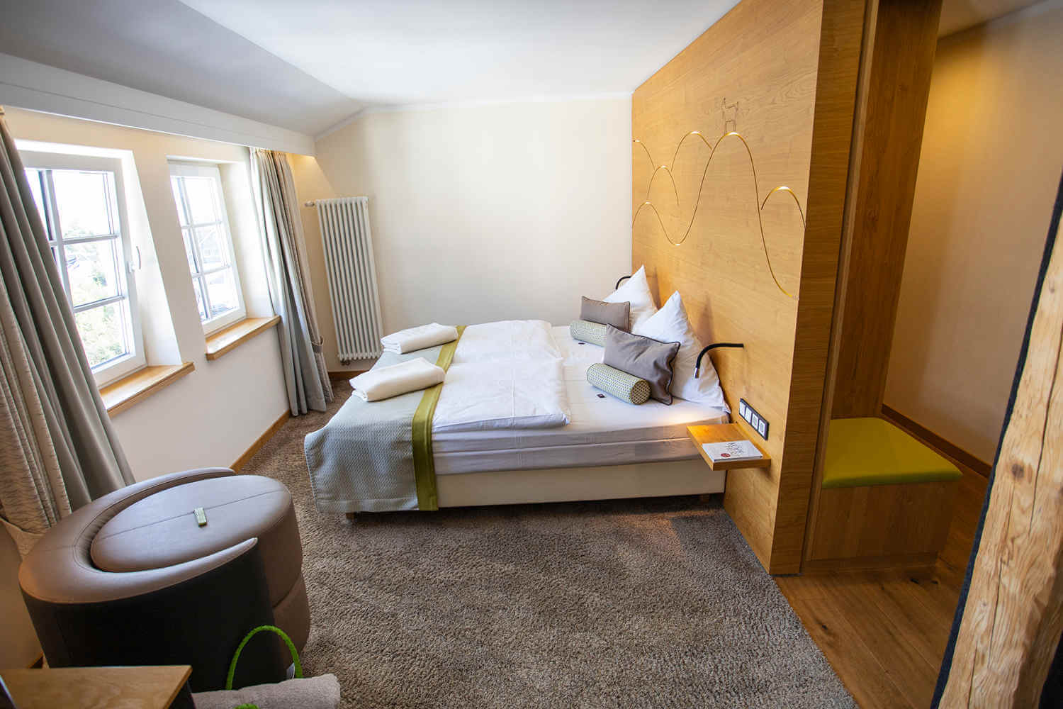 Side view of the cozy double room &quot;Stammhaus Premium Plus Talseite&quot; at the DIEDRICH Wellnesshotel &amp; Spa, NRW